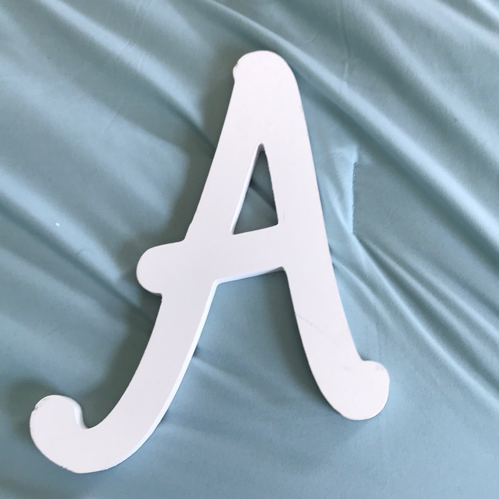 Decorative “A” letter.